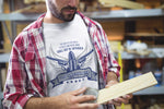 Man wearing a 2nd Amendment Patriotic American Short Sleeve Crew Neck White T-Shirt with the words the right of the people to keep and bear arms shall not be infringed featuring a bullet and revolvers with wings